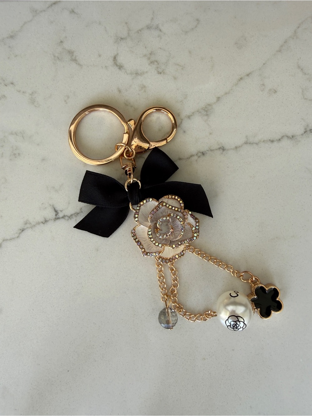 Luxury Inspired Gold-tone Black Bow & Floral Bag Charm